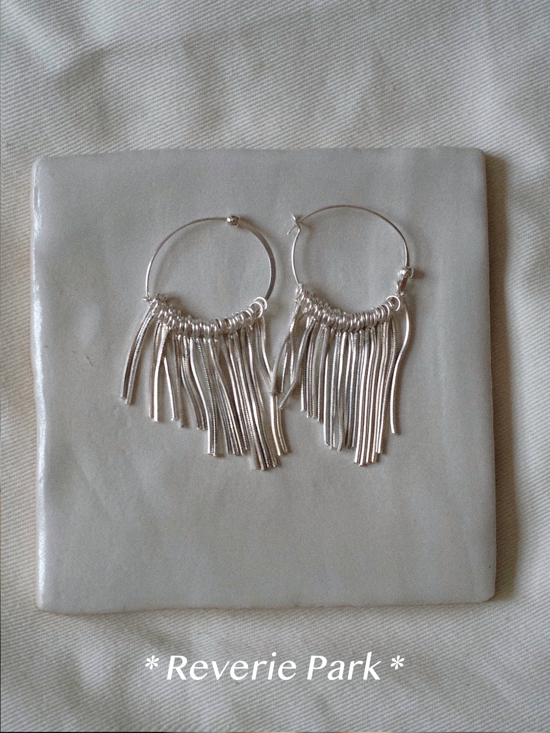 White Tassel ear Loops